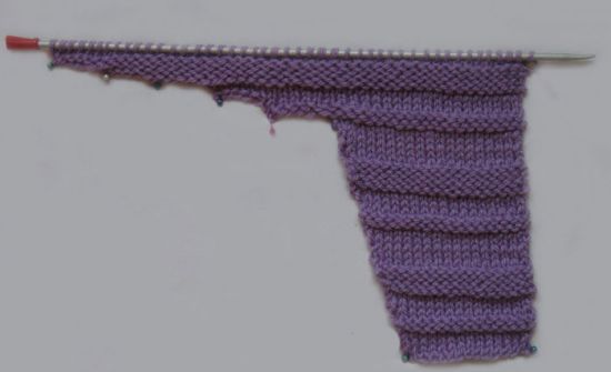 Як звязати конверт спицями для новонародженого