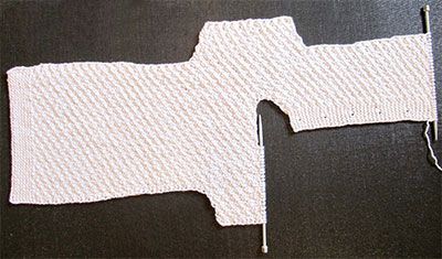 Як звязати конверт спицями для новонародженого