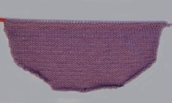 Як звязати конверт спицями для новонародженого