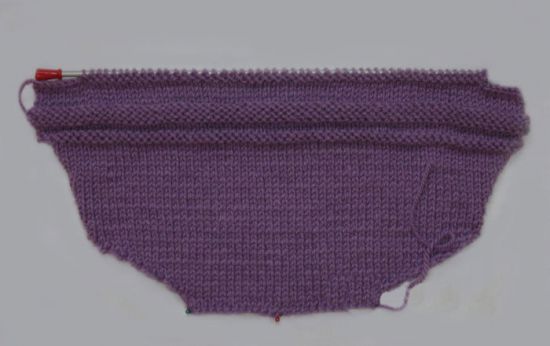 Як звязати конверт спицями для новонародженого