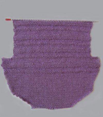 Як звязати конверт спицями для новонародженого