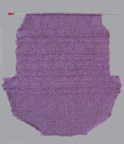 Як звязати конверт спицями для новонародженого