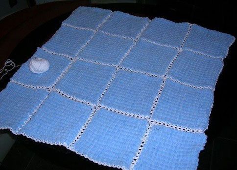 Вязані пледи для новонародженого