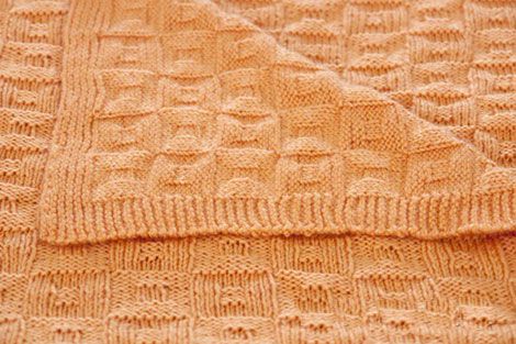 Вязані пледи для новонародженого