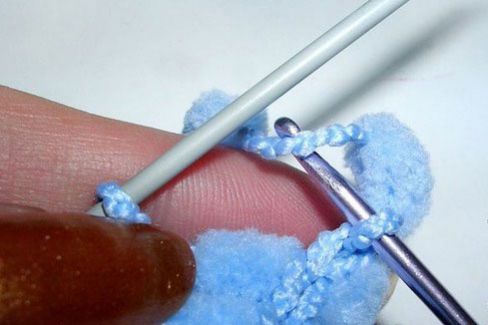 Вязані пледи для новонародженого