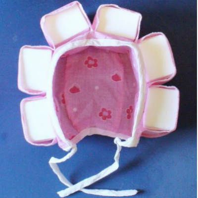 Види шапочок для новонародженого