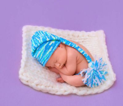 Види шапочок для новонародженого